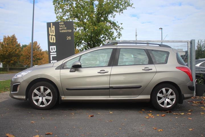 Orange Peugeot 308 fra 2012