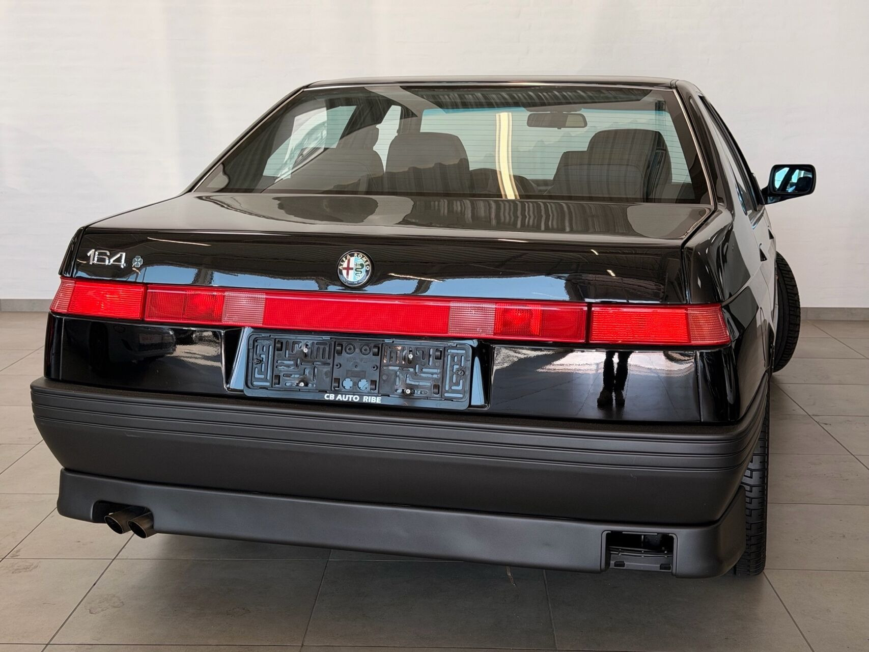 Sort Alfa Romeo 164 fra 1993