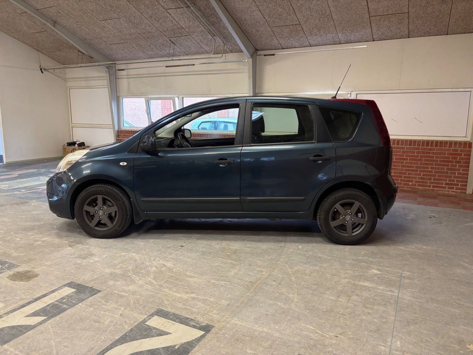 Blå Nissan Note fra 2011