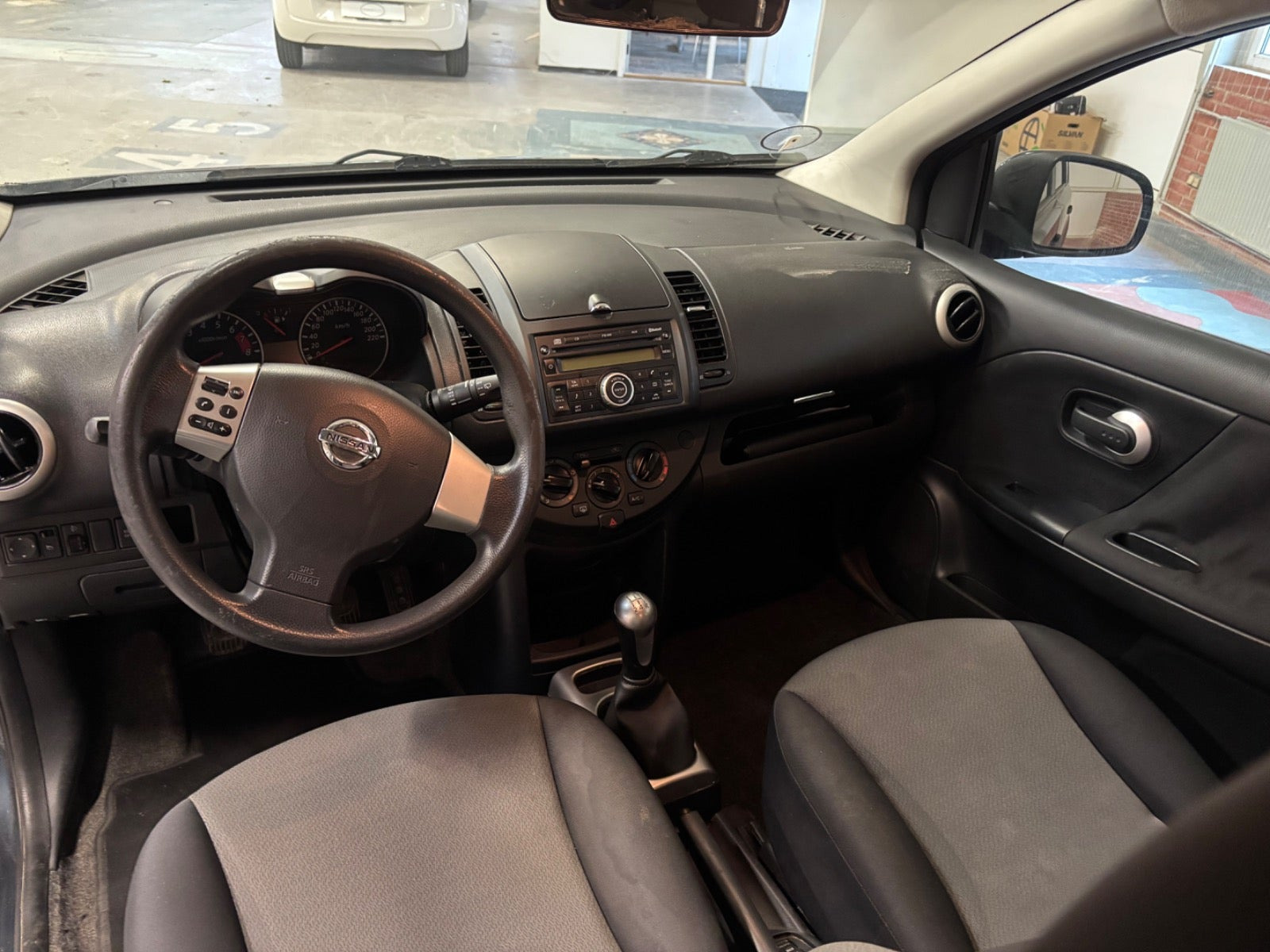 Blå Nissan Note fra 2011