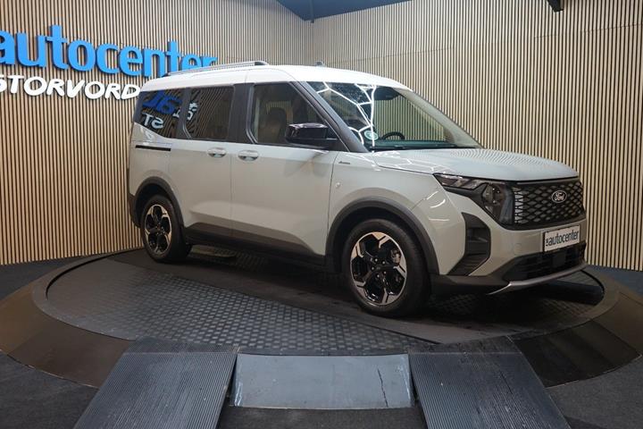 Grå Ford E-Tourneo Courier fra 2026 set udefra