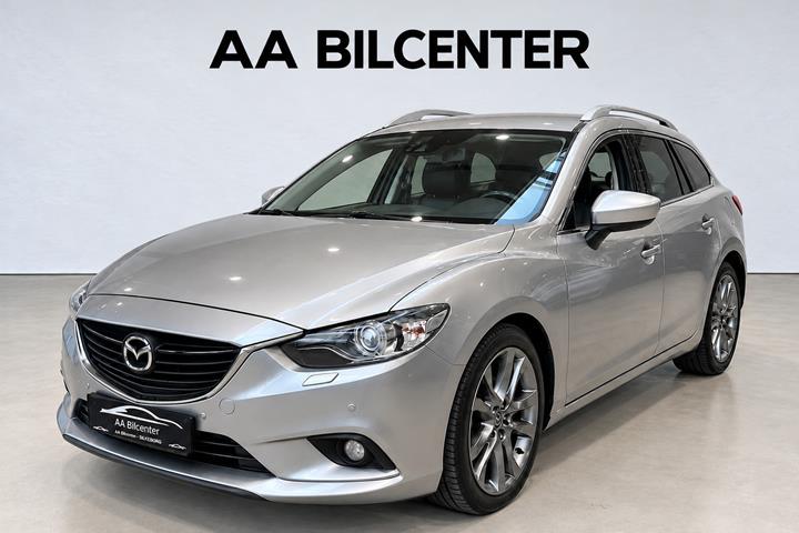 Grå Mazda 6 fra 2013 set udefra