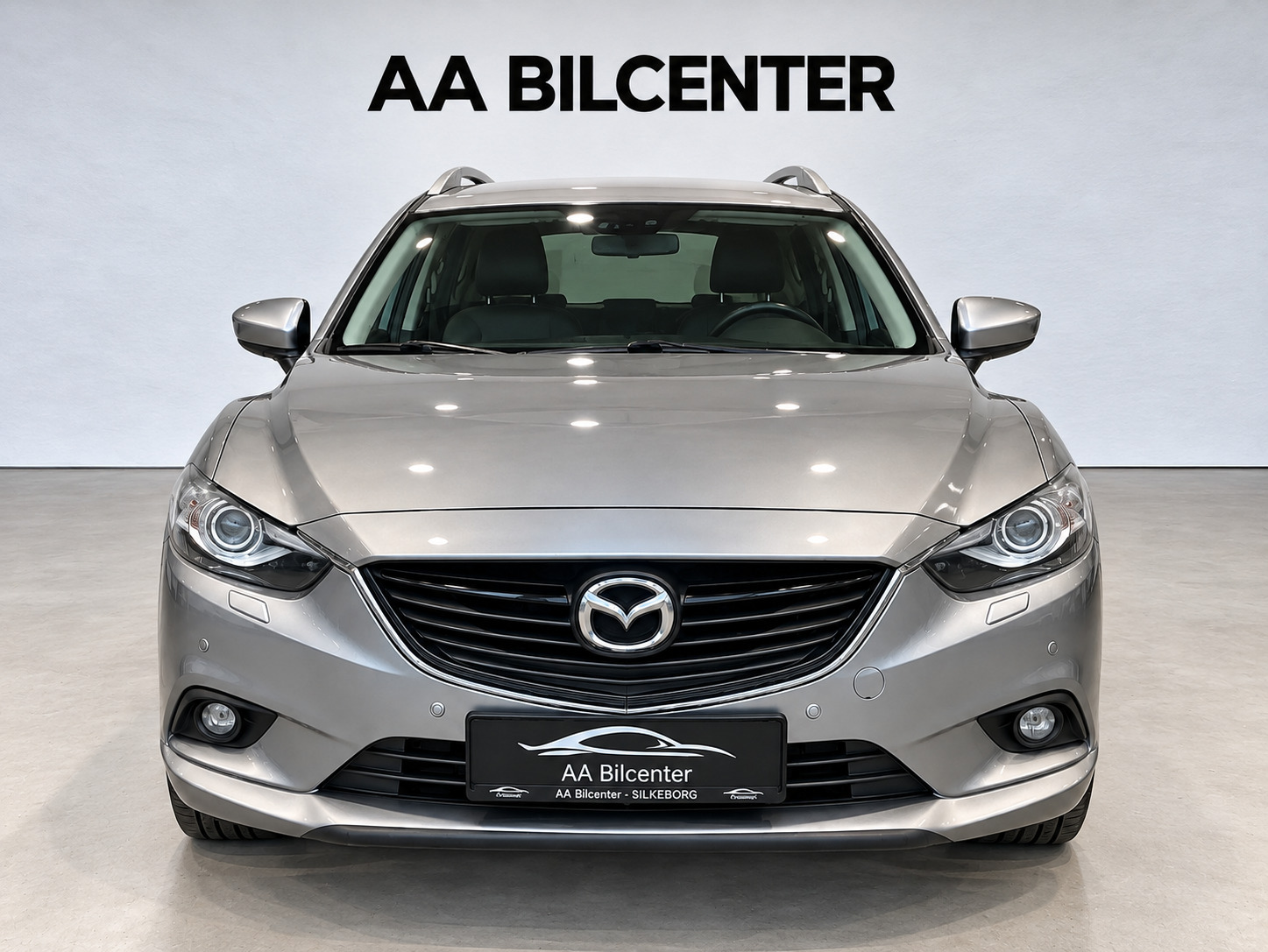 Grå Mazda 6 fra 2013