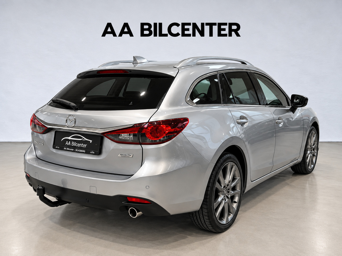 Grå Mazda 6 fra 2013