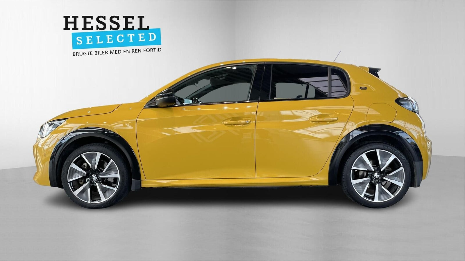 Gul Peugeot e-208 fra 2021