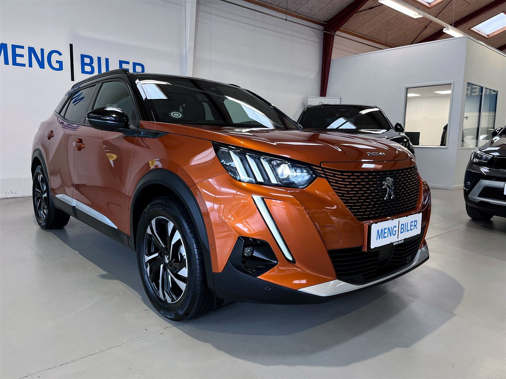 Orange Peugeot e-2008 fra 2022