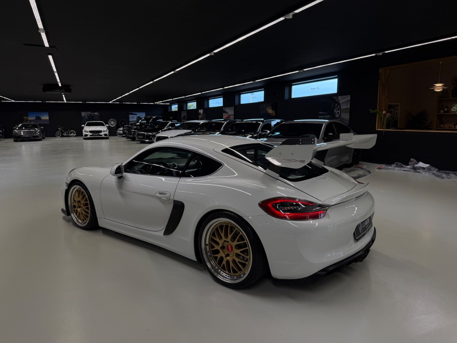 Gul Porsche Cayman S fra 2013