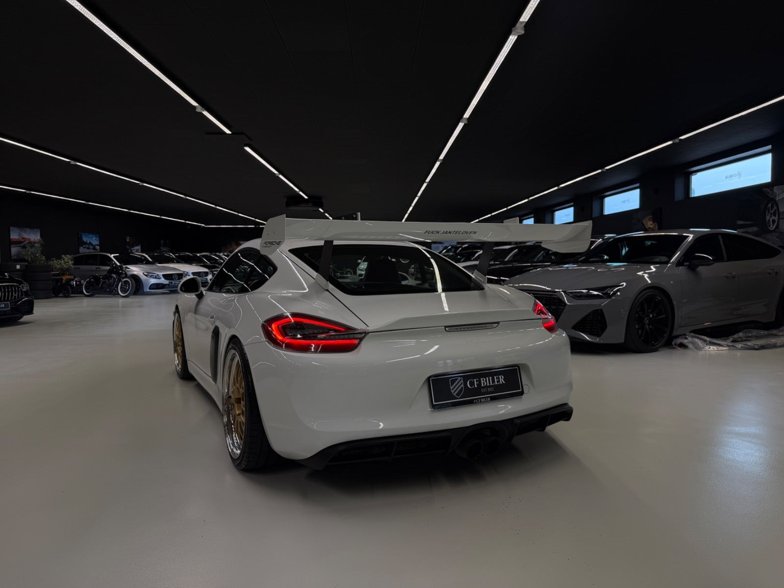 Gul Porsche Cayman S fra 2013