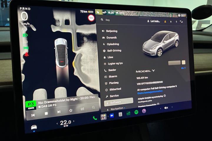 Grå Tesla Model Y fra 2024