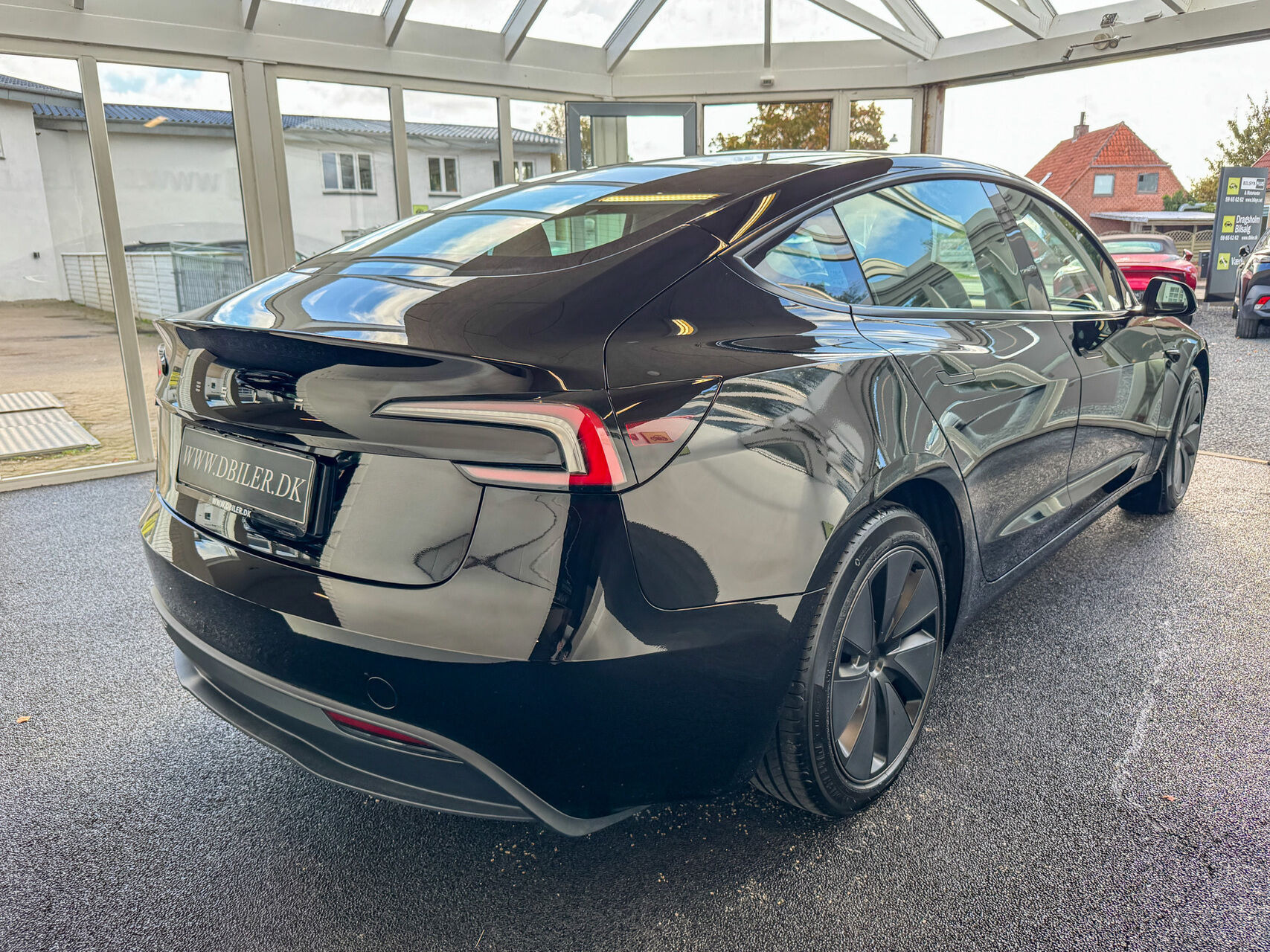 Sort Tesla Model 3 fra 2024