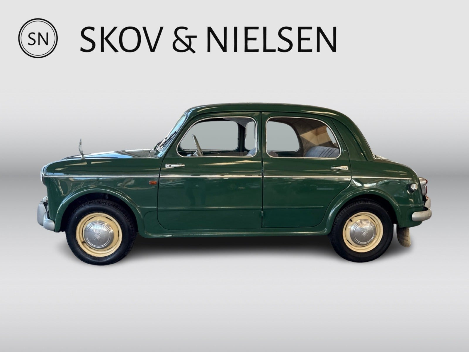 Grøn Fiat 1100 fra 1956 set udefra