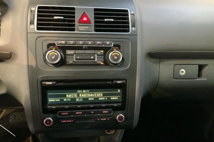 Sølv VW Touran fra 2012