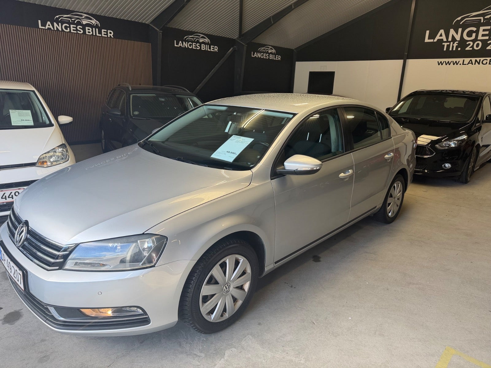 Sølv VW Passat fra 2013