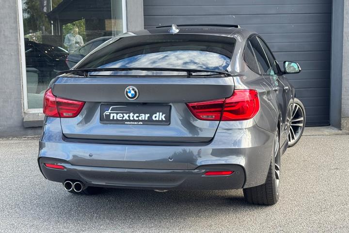 Grå BMW 330i fra 2017