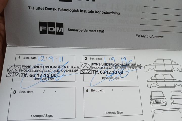 Rød Nissan Note fra 2011