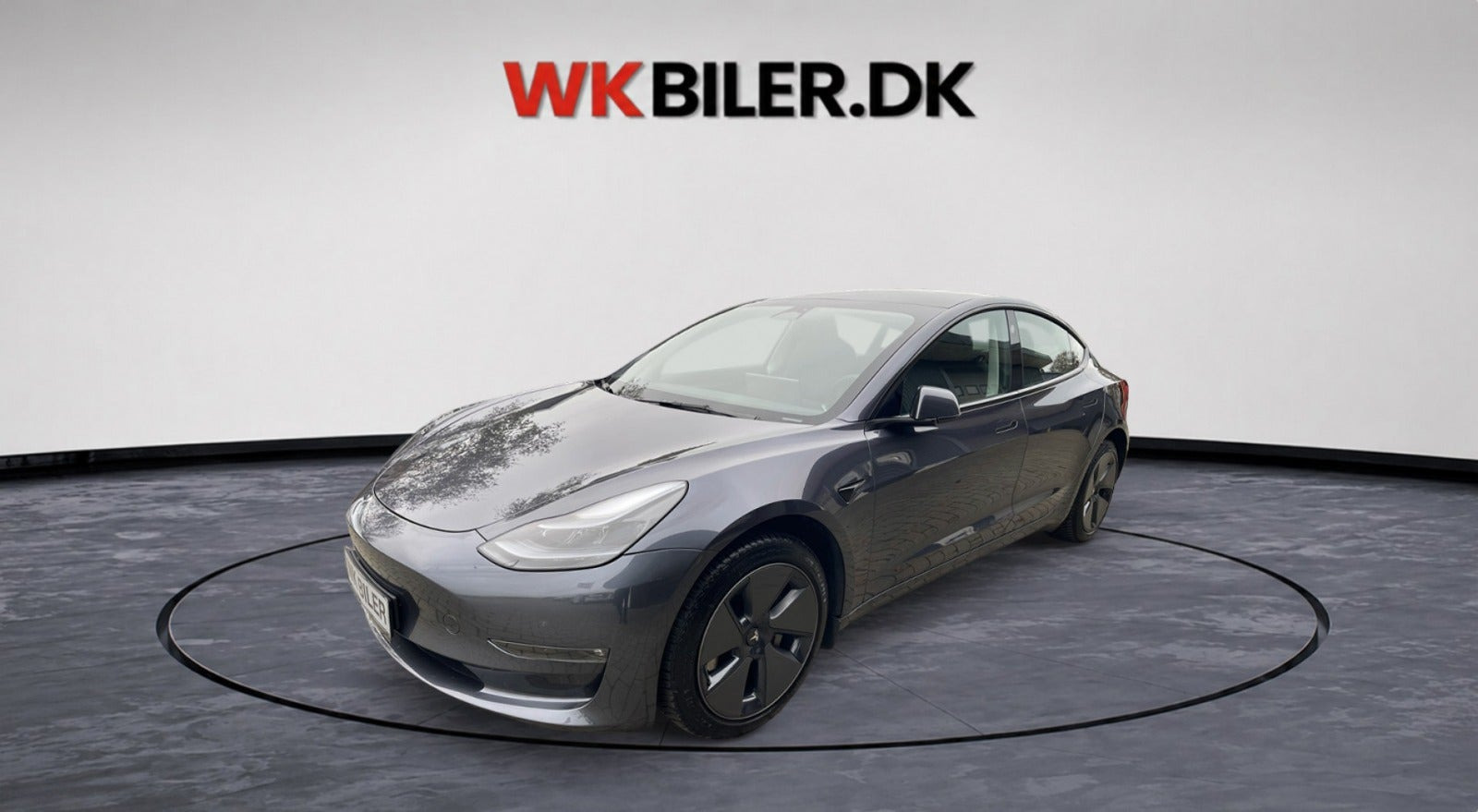 Grå Tesla Model 3 fra 2023