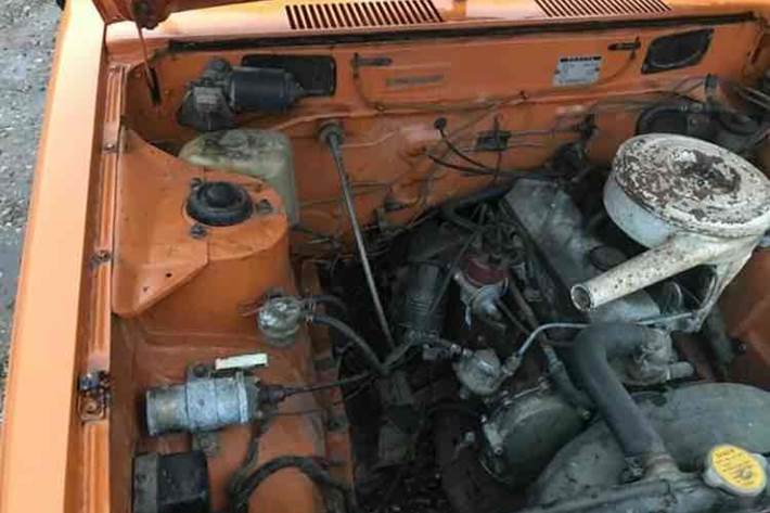 Orange Toyota Corolla fra 1976