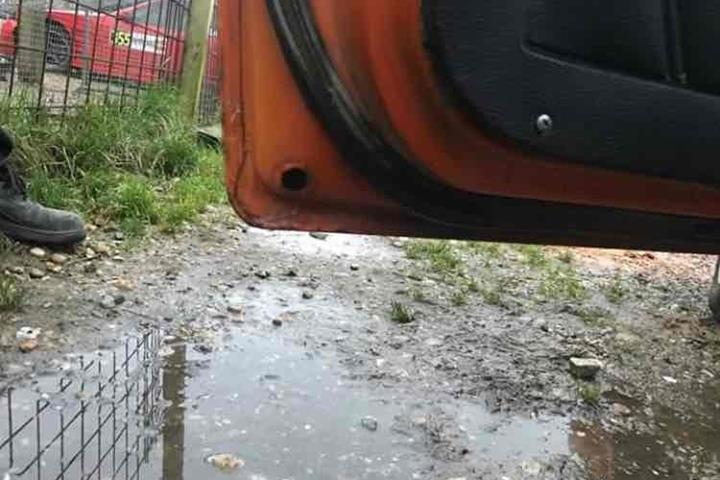 Orange Toyota Corolla fra 1976
