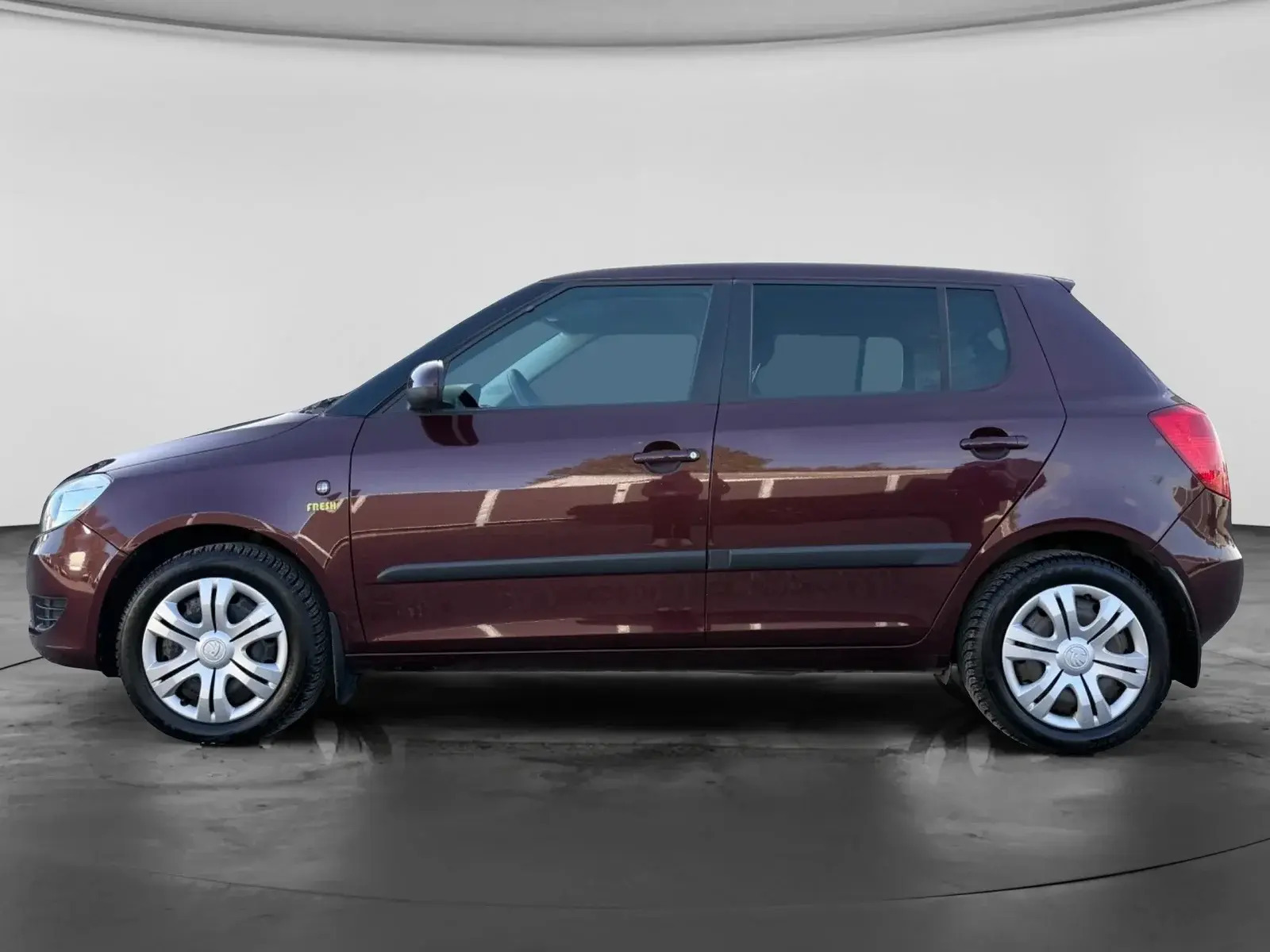 Rød Skoda Fabia fra 2013