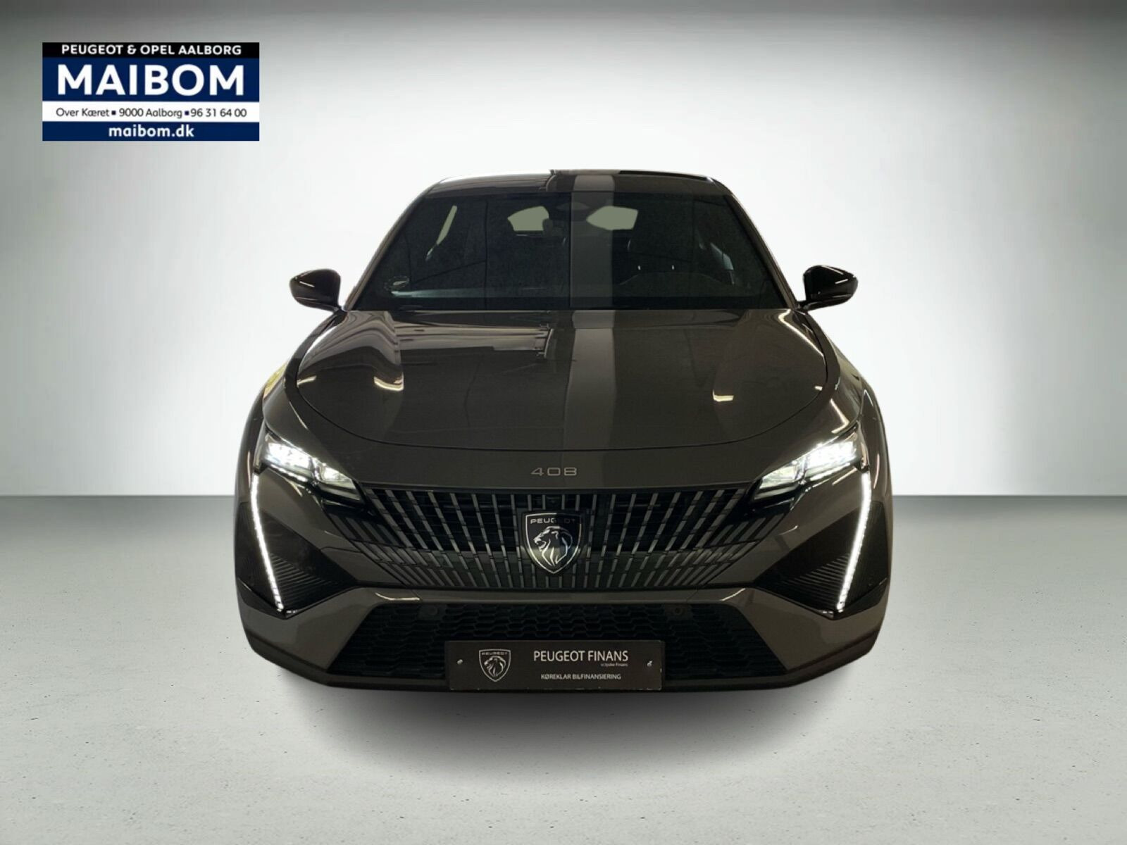 Grå Peugeot e-408 fra 2025