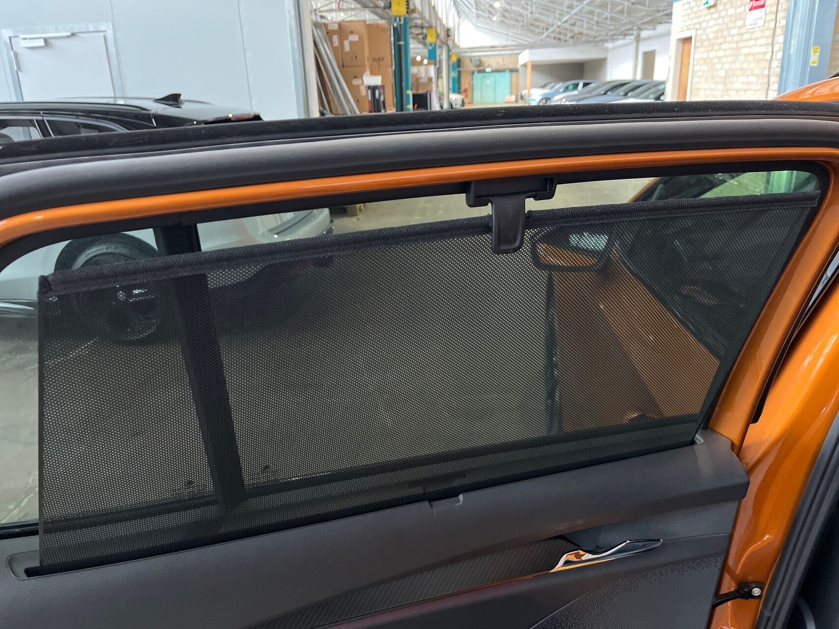 Orange Skoda Enyaq fra 2023