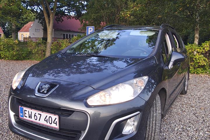 Grå Peugeot 308 fra 2012