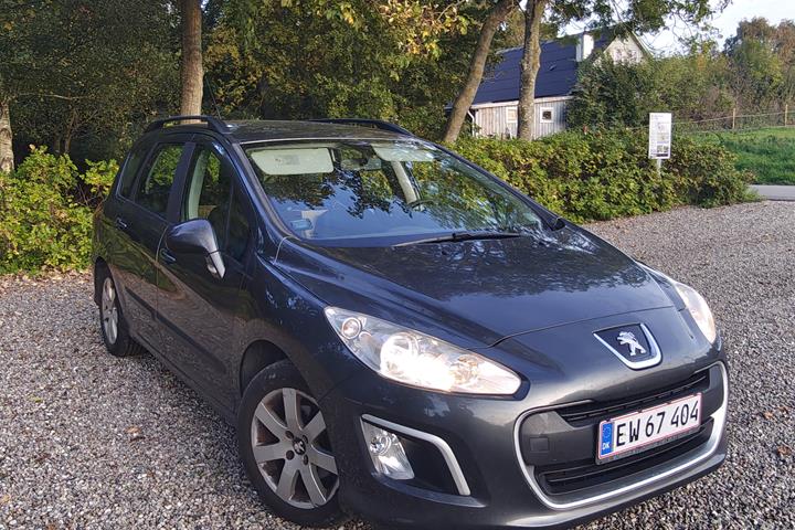 Grå Peugeot 308 fra 2012