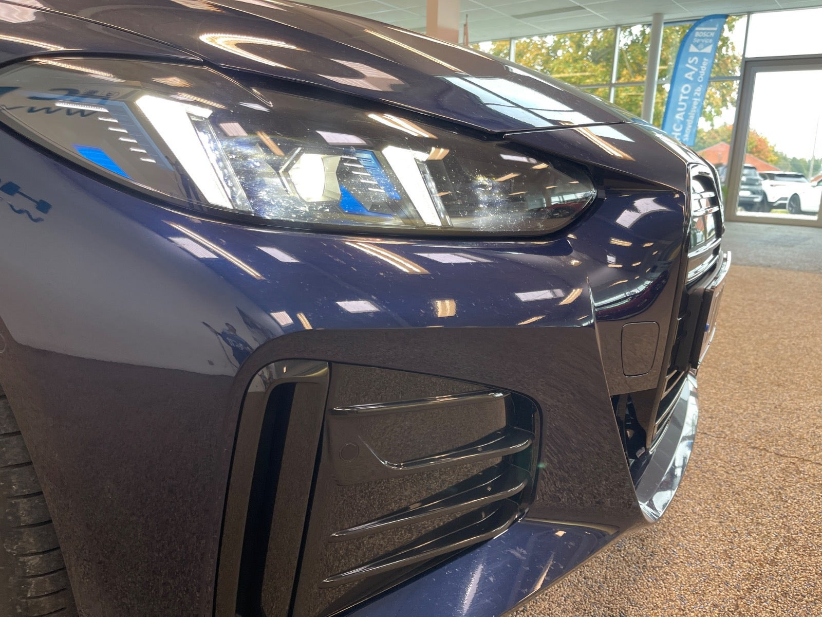 Blå BMW i4 fra 2024