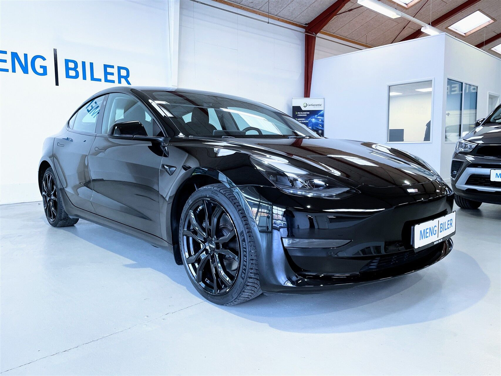 Sort Tesla Model 3 fra 2022