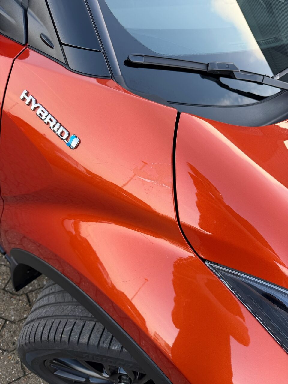 Orange Toyota C-HR fra 2021