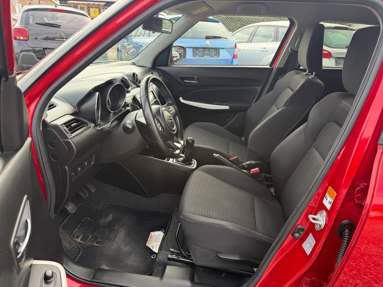 Rød Suzuki Swift fra 2017