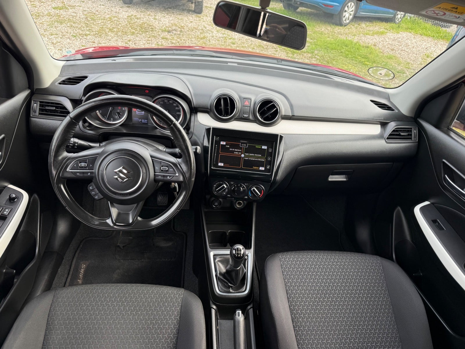 Rød Suzuki Swift fra 2017