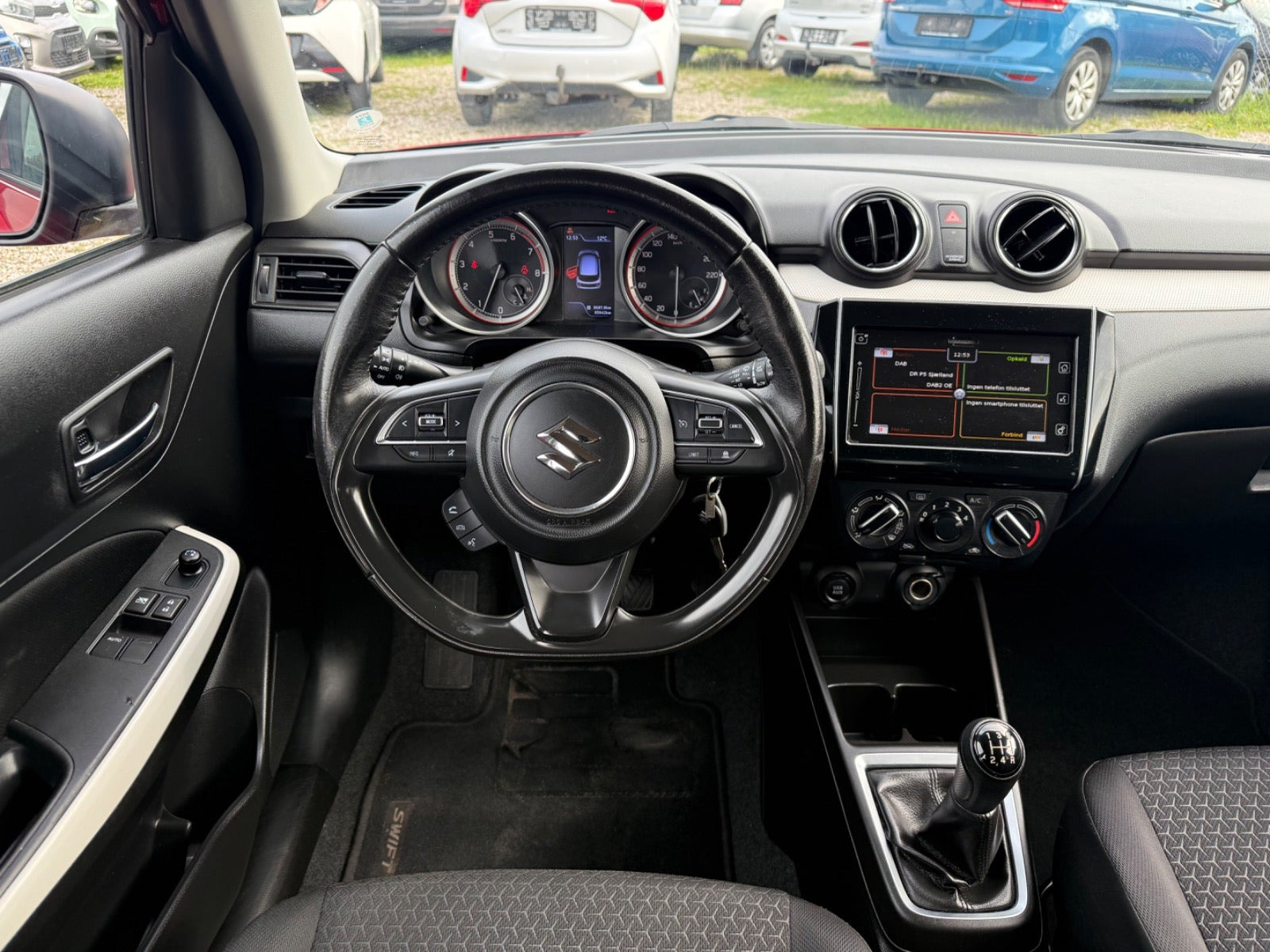 Rød Suzuki Swift fra 2017