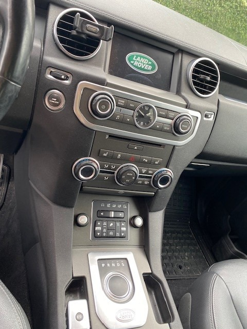 Rød Land Rover Discovery 4 fra 2014