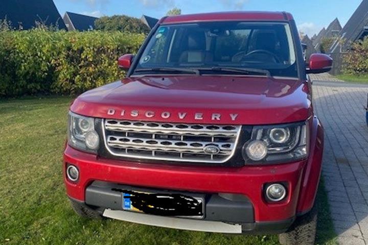 Rød Land Rover Discovery 4 fra 2014