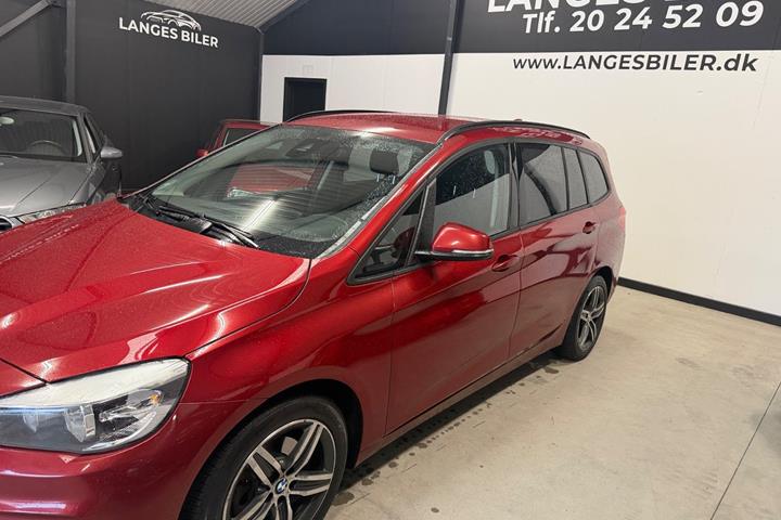 Rød BMW 216d fra 2015