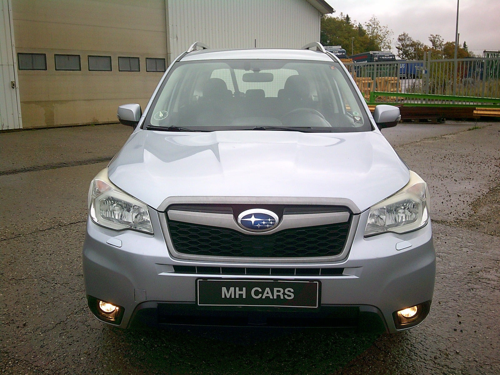 Gul Subaru Forester fra 2013