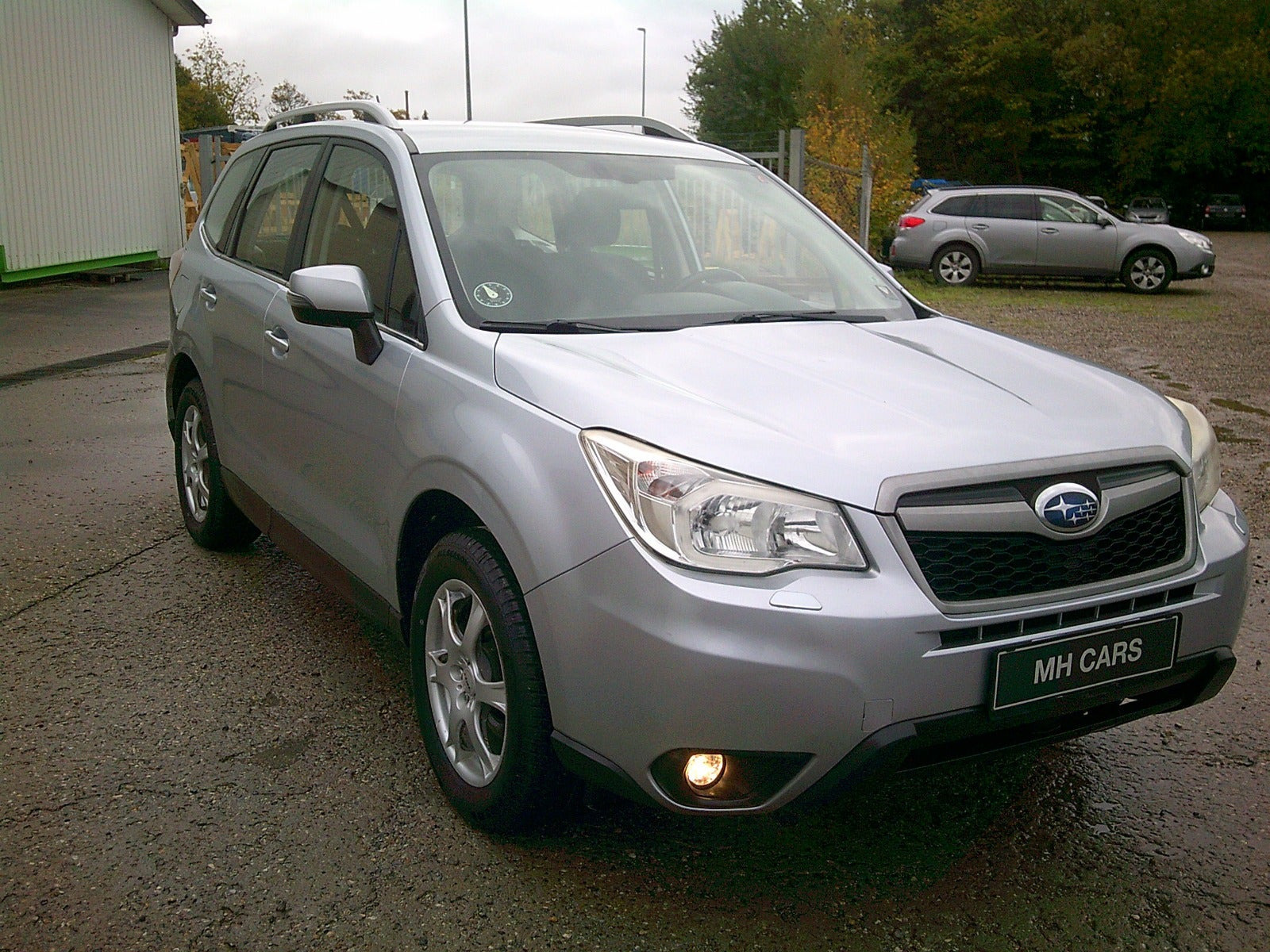 Gul Subaru Forester fra 2013