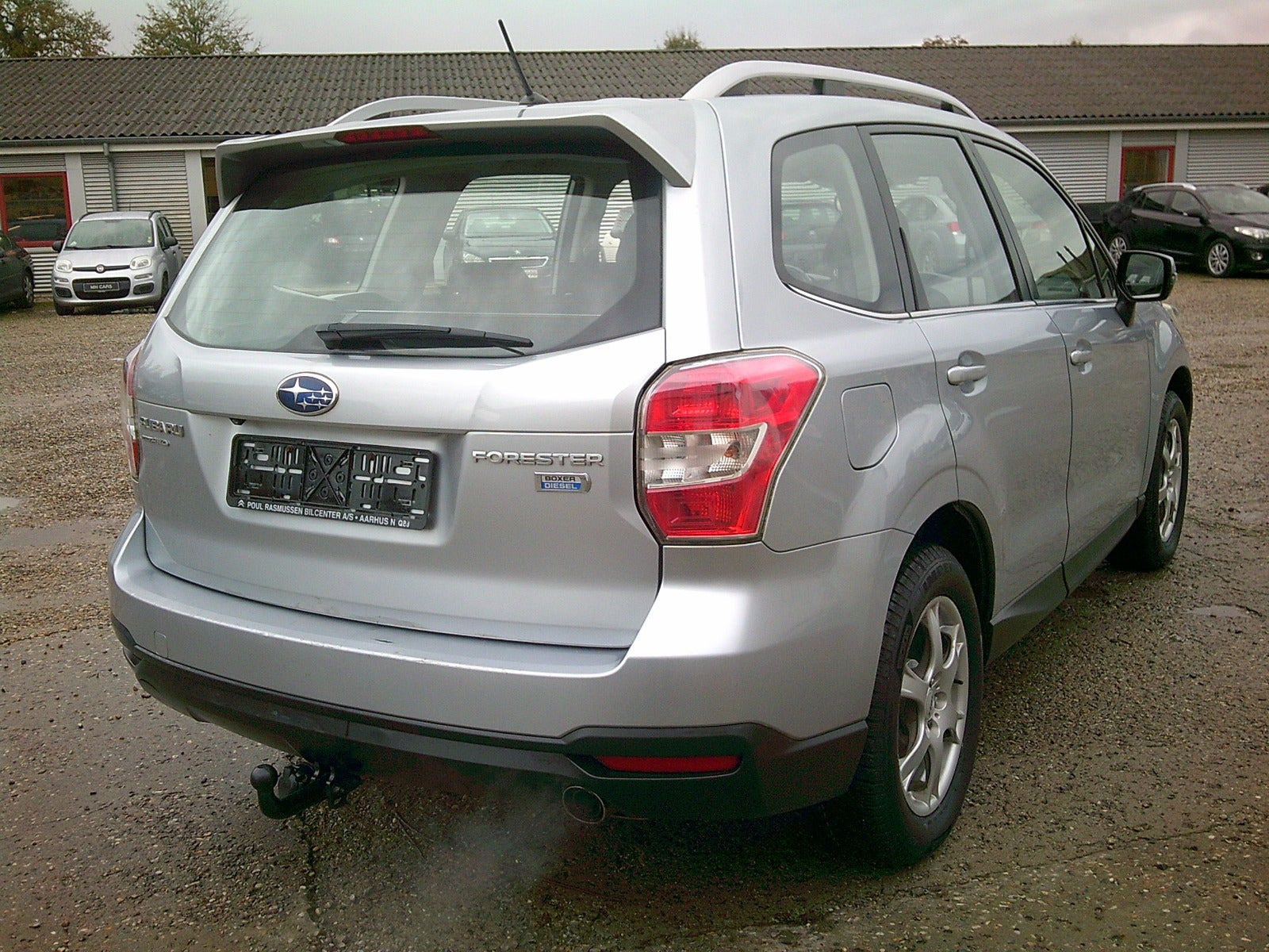Gul Subaru Forester fra 2013