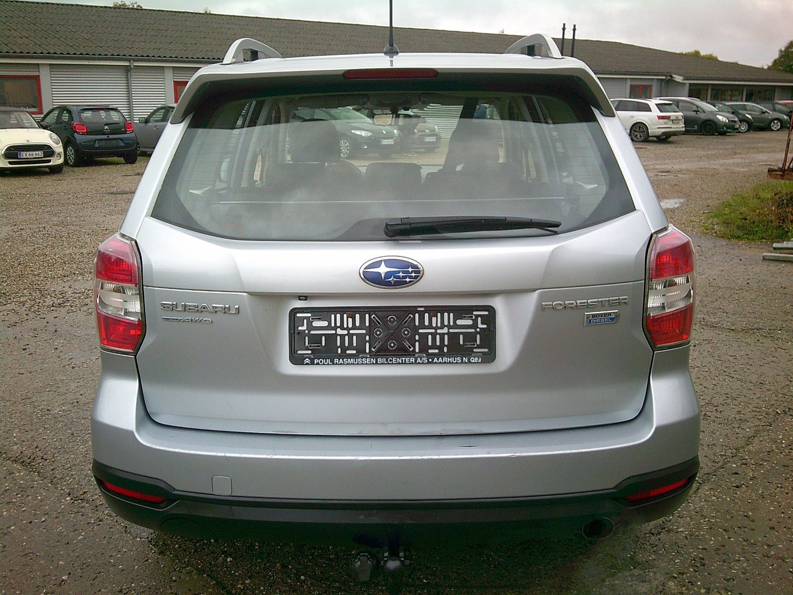 Gul Subaru Forester fra 2013