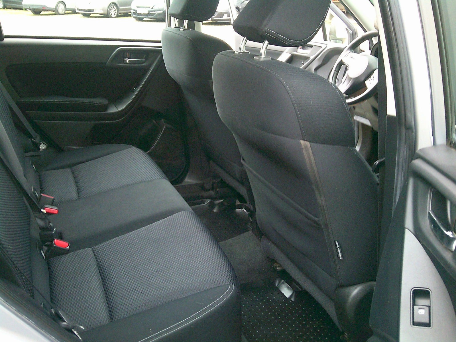 Gul Subaru Forester fra 2013