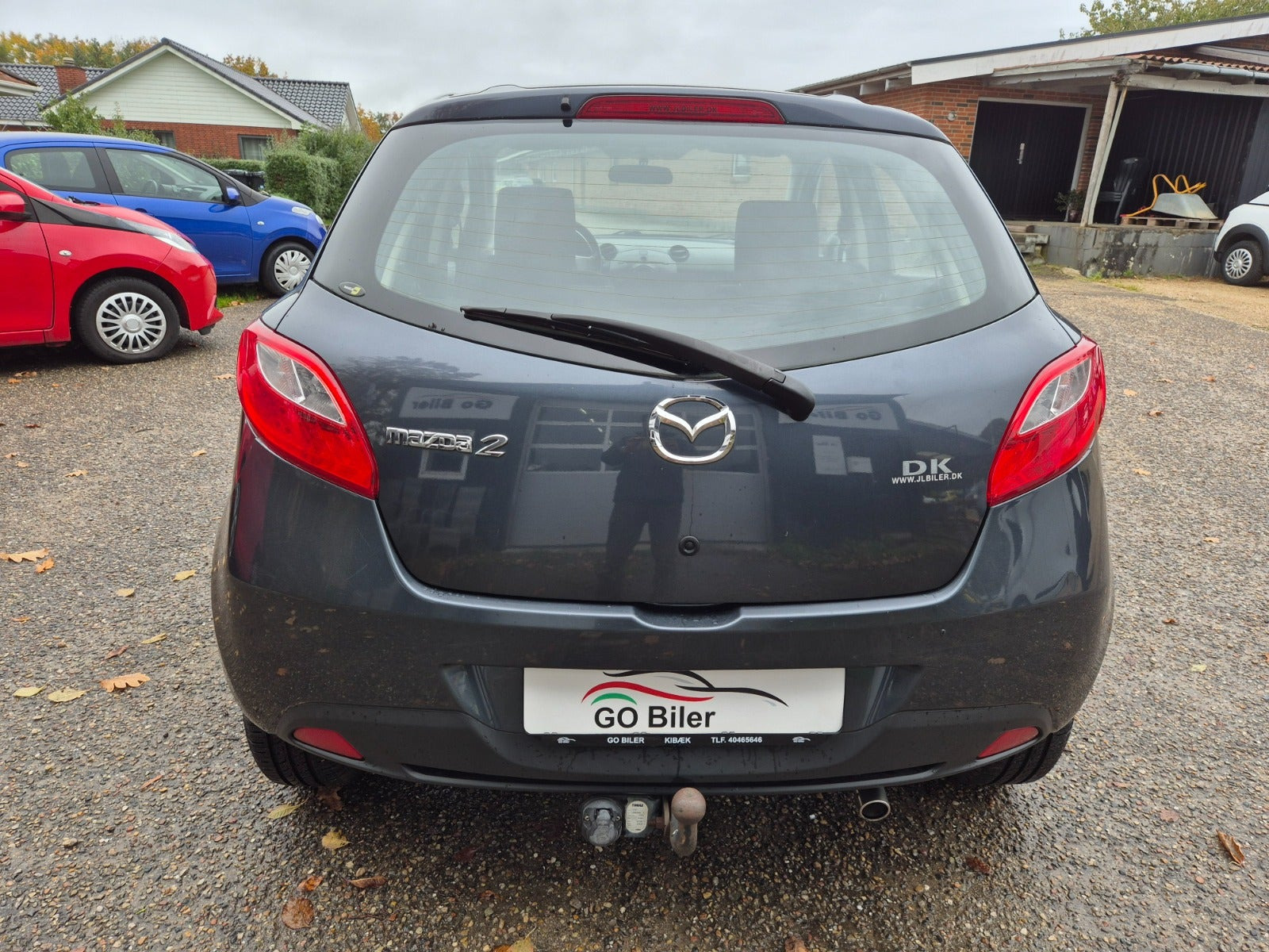Grøn Mazda 2 fra 2009