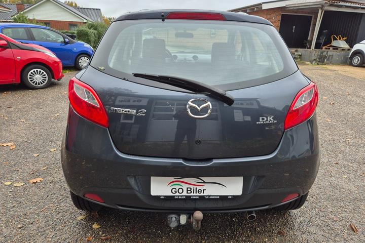 Grøn Mazda 2 fra 2009