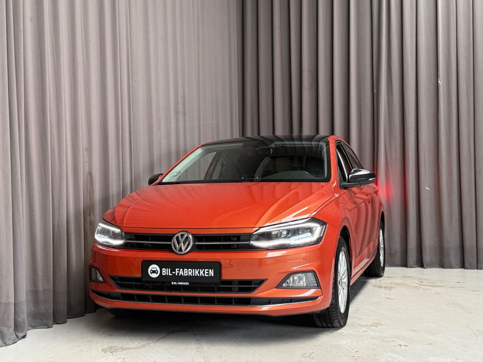 Orange VW Polo fra 2019