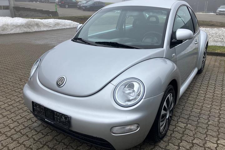 Sølv VW New Beetle fra 2000