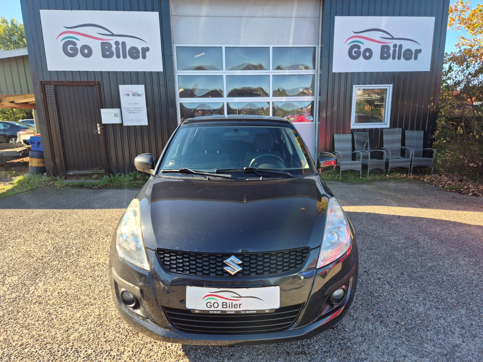 Grøn Suzuki Swift fra 2012