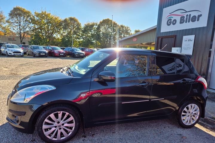 Grøn Suzuki Swift fra 2012