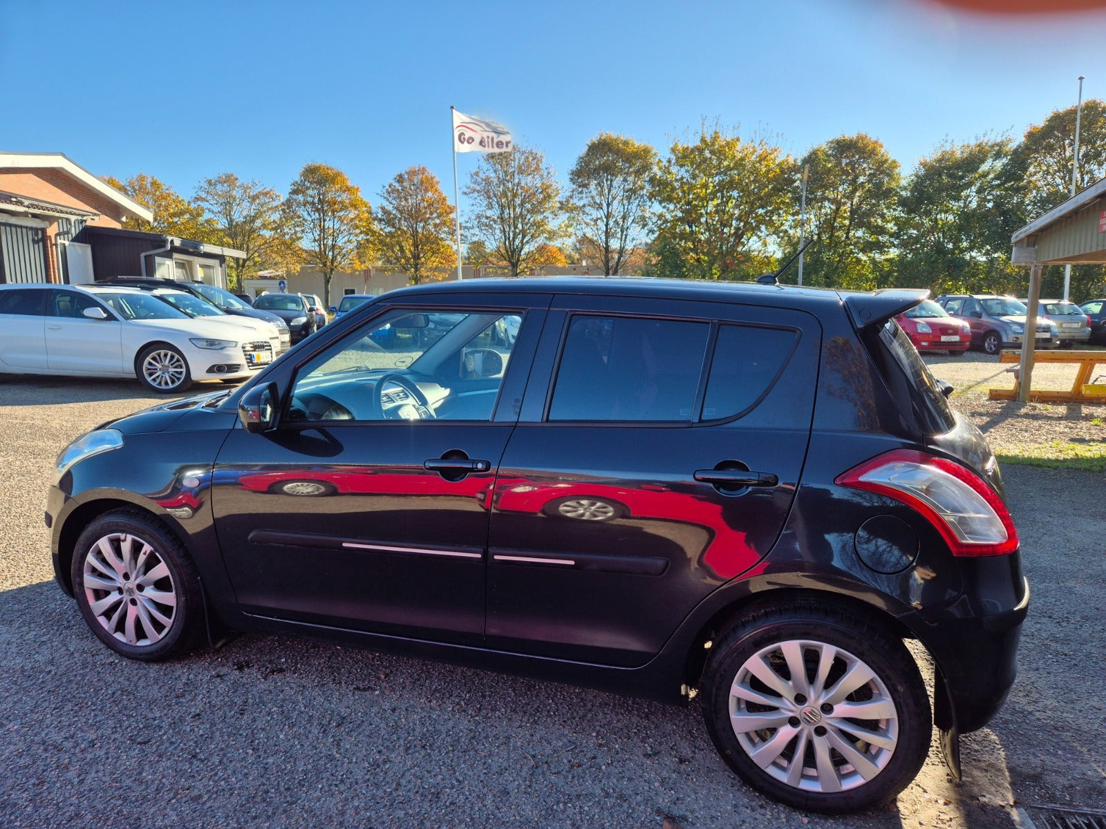 Grøn Suzuki Swift fra 2012