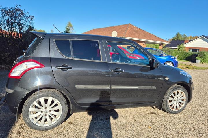 Grøn Suzuki Swift fra 2012