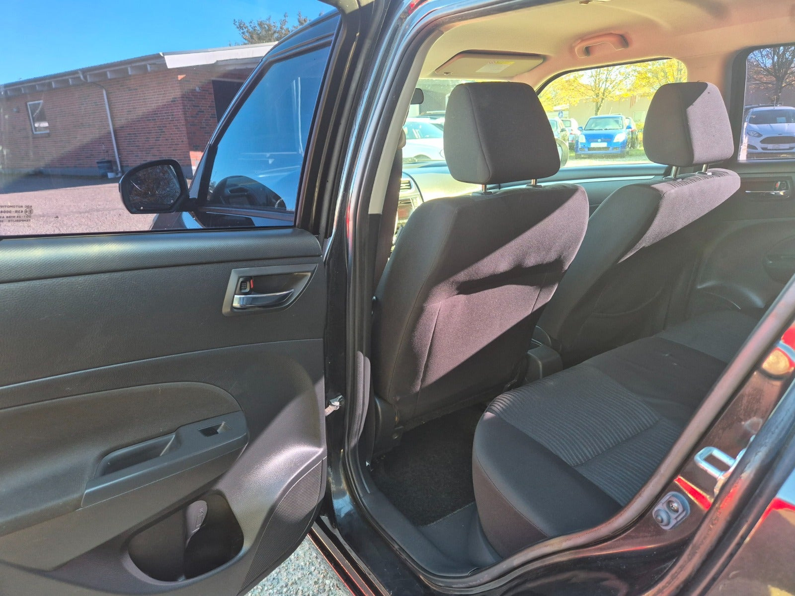 Grøn Suzuki Swift fra 2012
